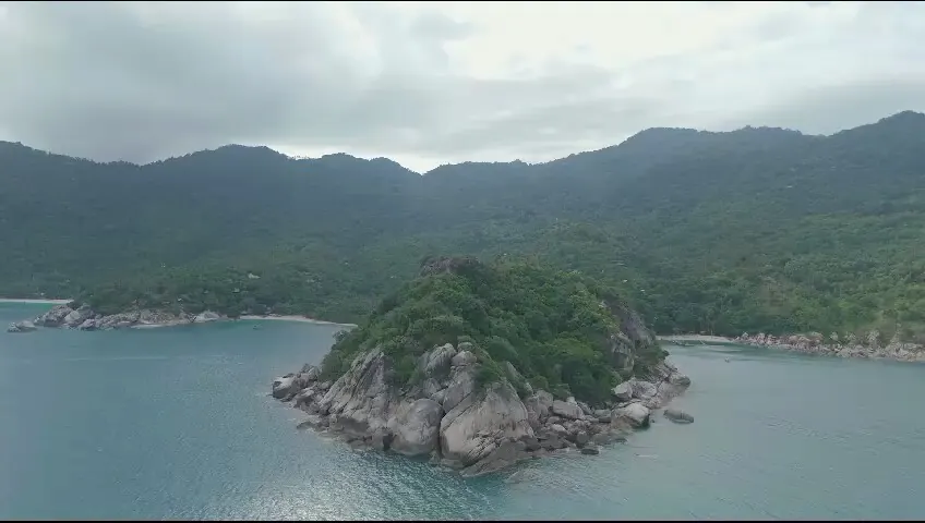Rocky islet and headland off the coast near Why Nam